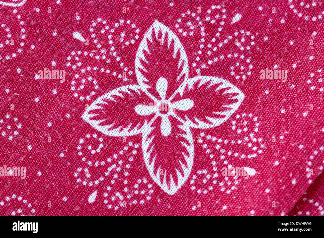 Thai Batik Sarong rote Blume Muster für den Hintergrund. Stockfoto