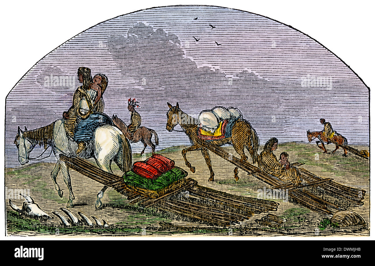 Indianer Reisen mit dem travois, 1800. Hand - farbige Holzschnitt Stockfoto