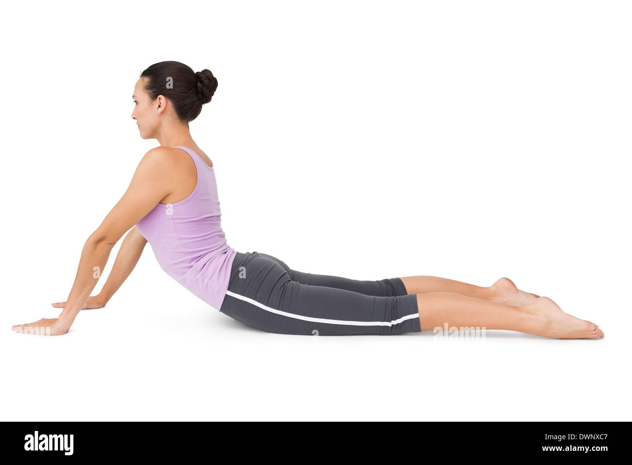 Seitenansicht einer Fit junge Frau tut die Kobra-pose Stockfoto