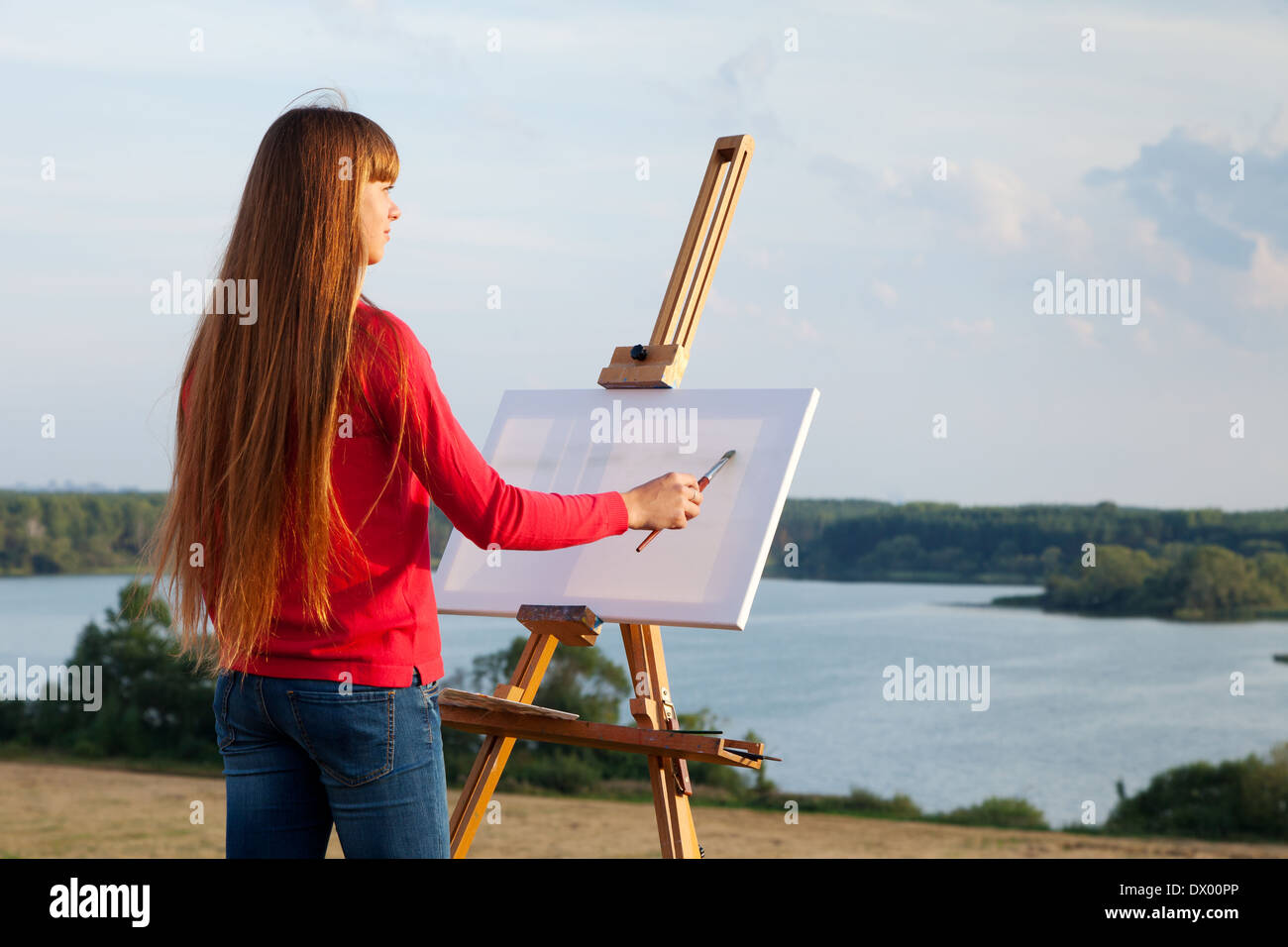 Künstler malen eine Meer-Landschaft Stockfoto