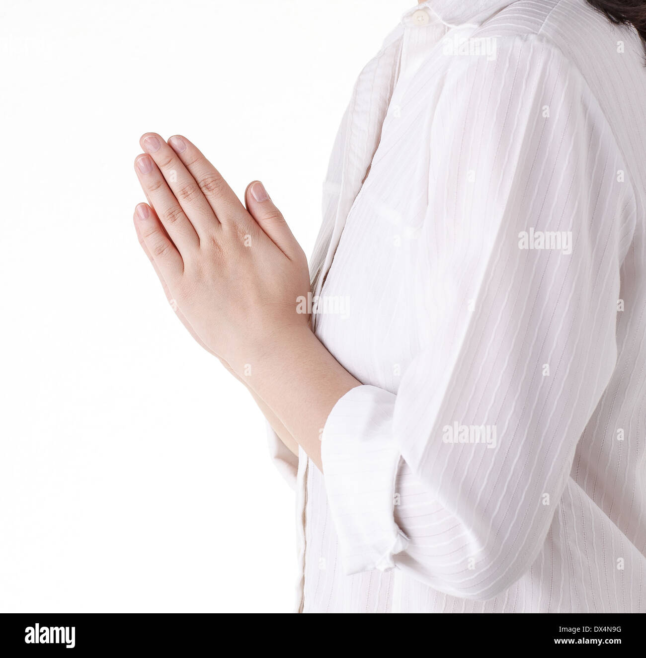 Frau beten isolierten auf weißen Hintergrund Stockfoto