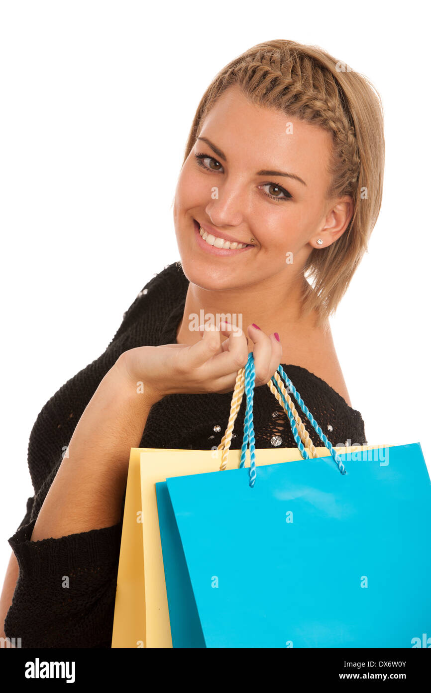 Attraktive junge Frau mit bunten Einkaufstüten Stockfoto