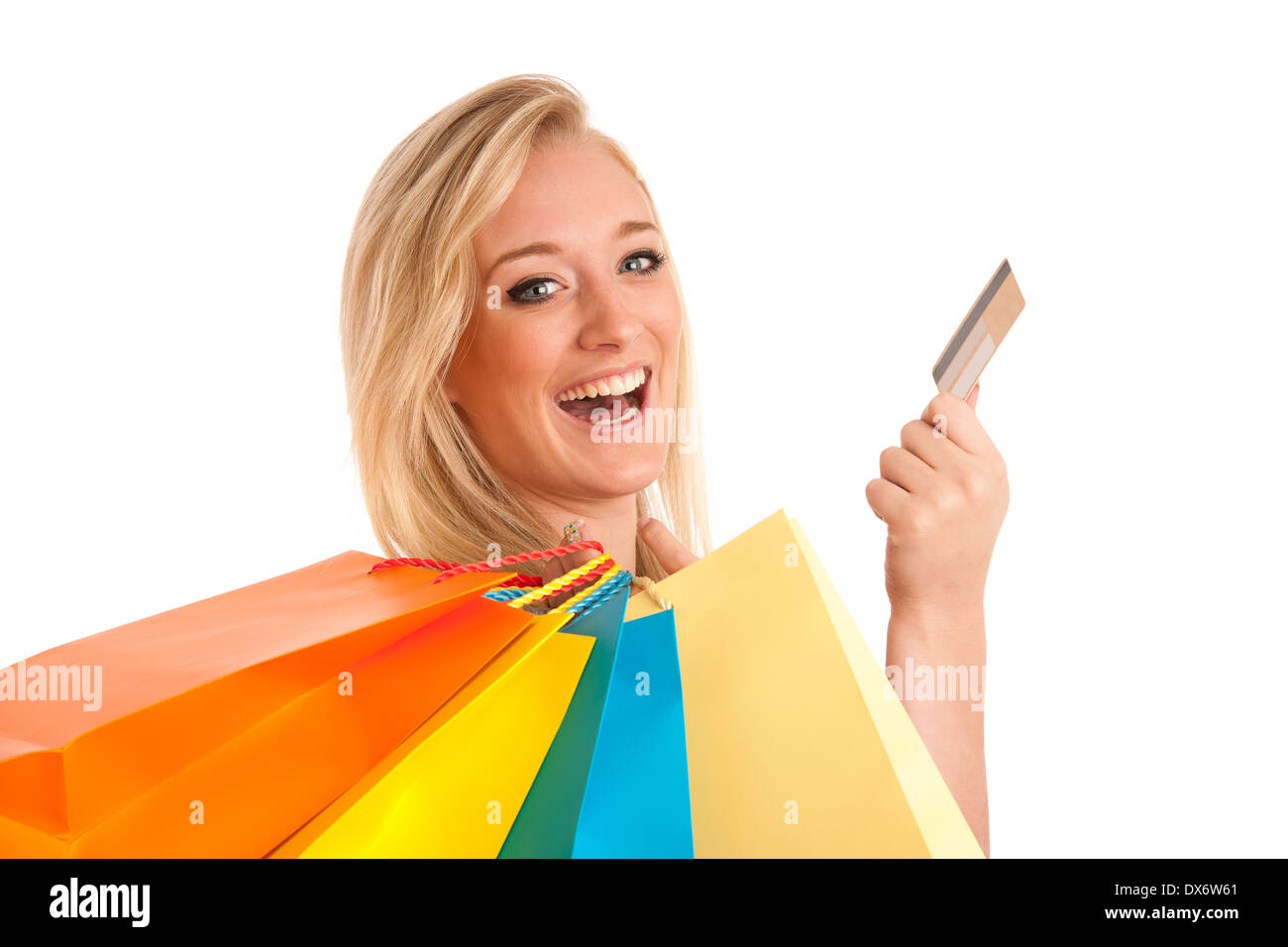Attraktive junge Frau mit bunten Einkaufstüten Stockfoto