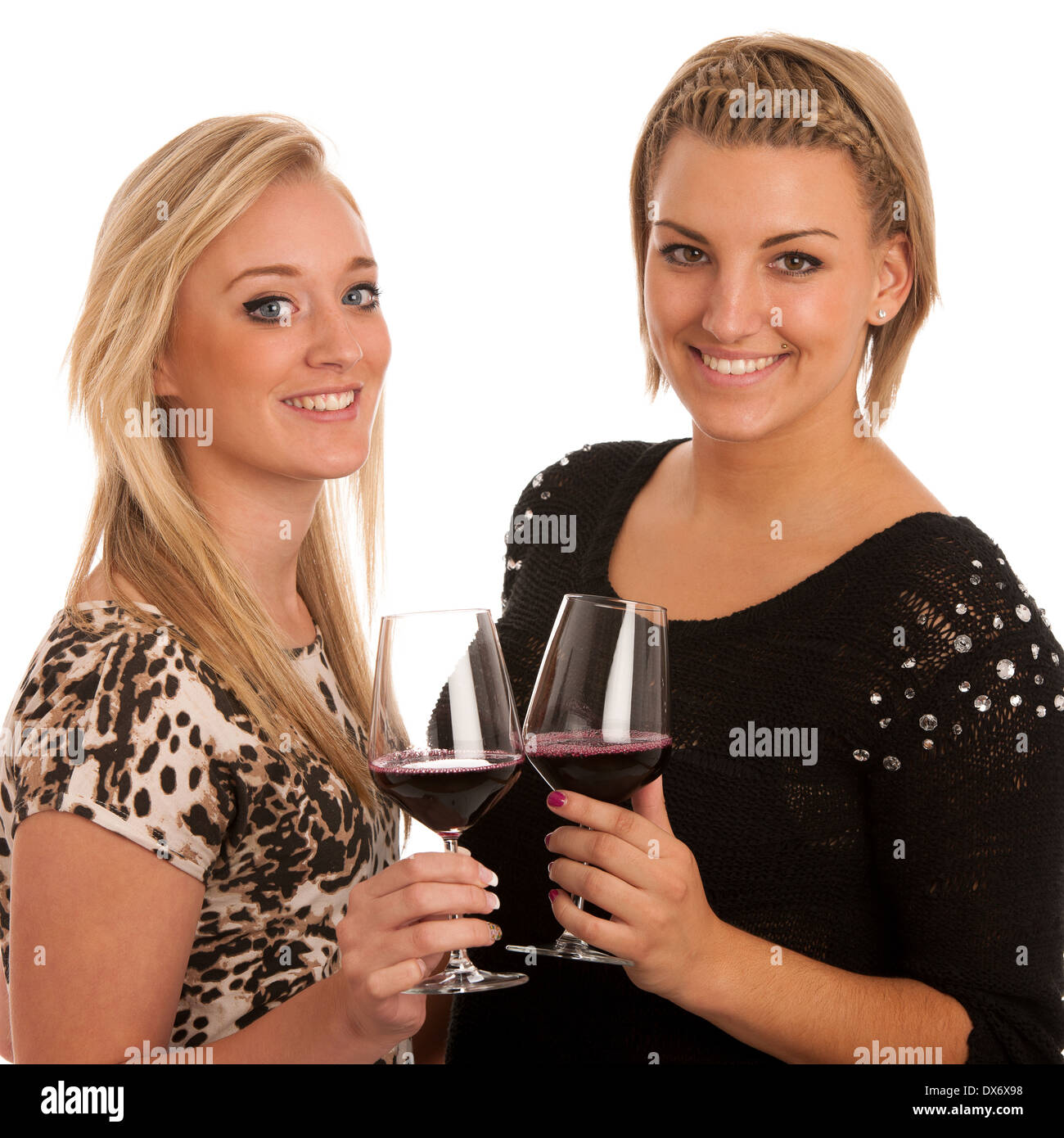 Toast - zwei Mädchen mit Glas Wein isoliert Stockfoto