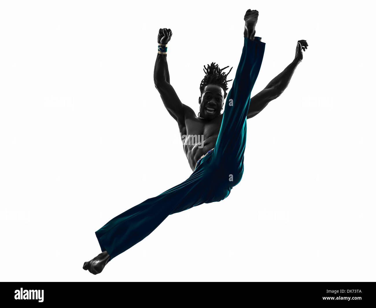 ein Mann Capoeira Tänzer tanzen Silhouette Studio isoliert auf weißem Hintergrund Stockfoto