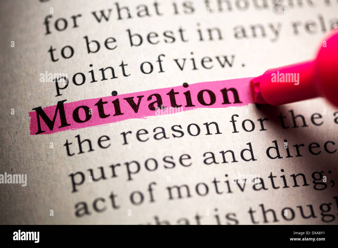 Gefälschte Wörterbuch, definiert das Wort Motivation. Stockfoto