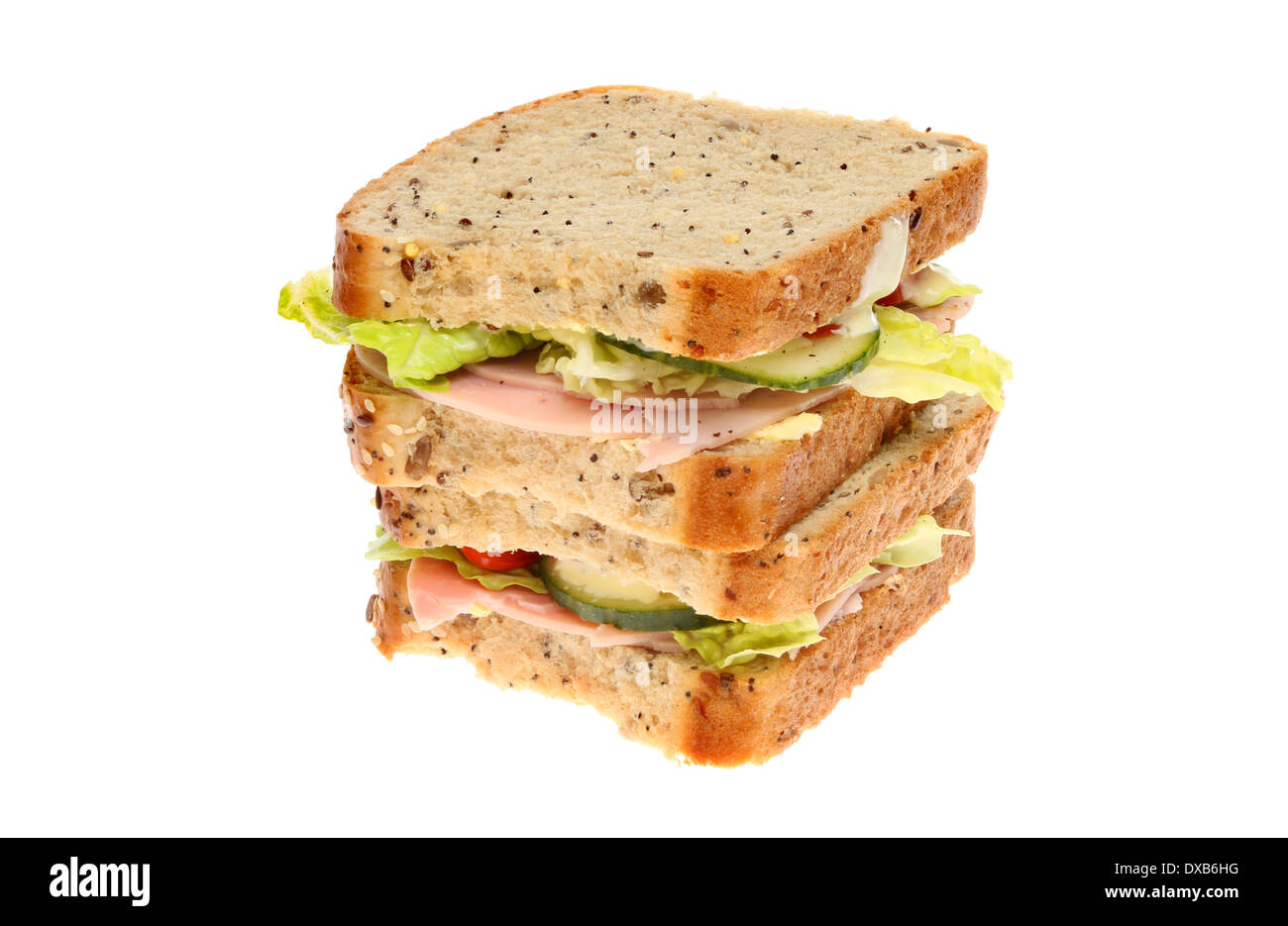 Stapel von Salat Schinkensandwiches isoliert gegen weiß Stockfoto