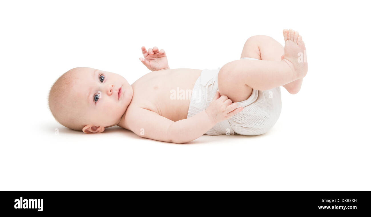 Kleinkind in Windel auf Rücken liegend. isoliert auf weißem Hintergrund Stockfoto