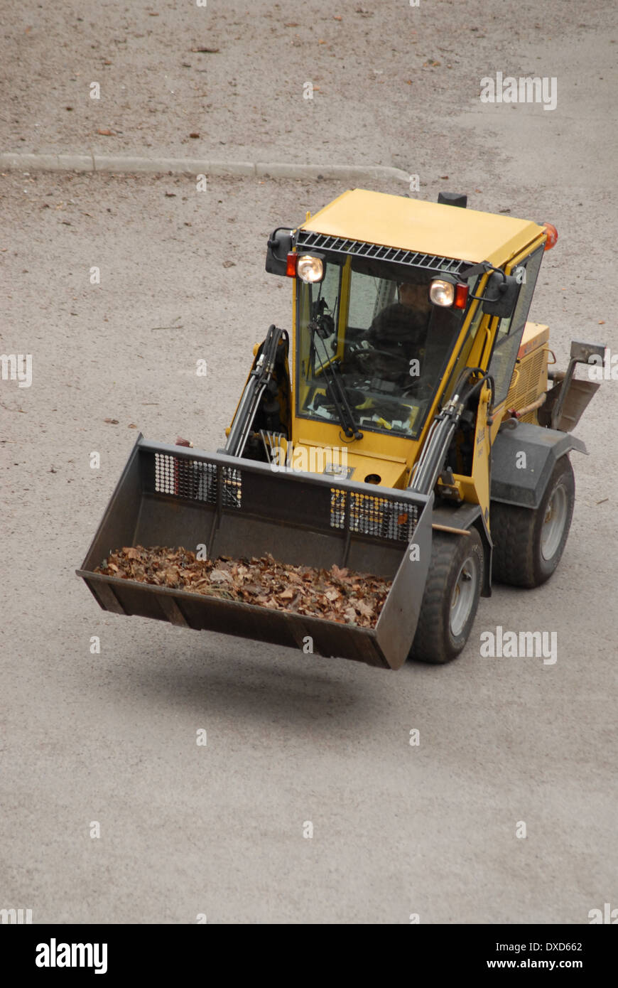 Gelbe Stadt Traktor. Stockfoto