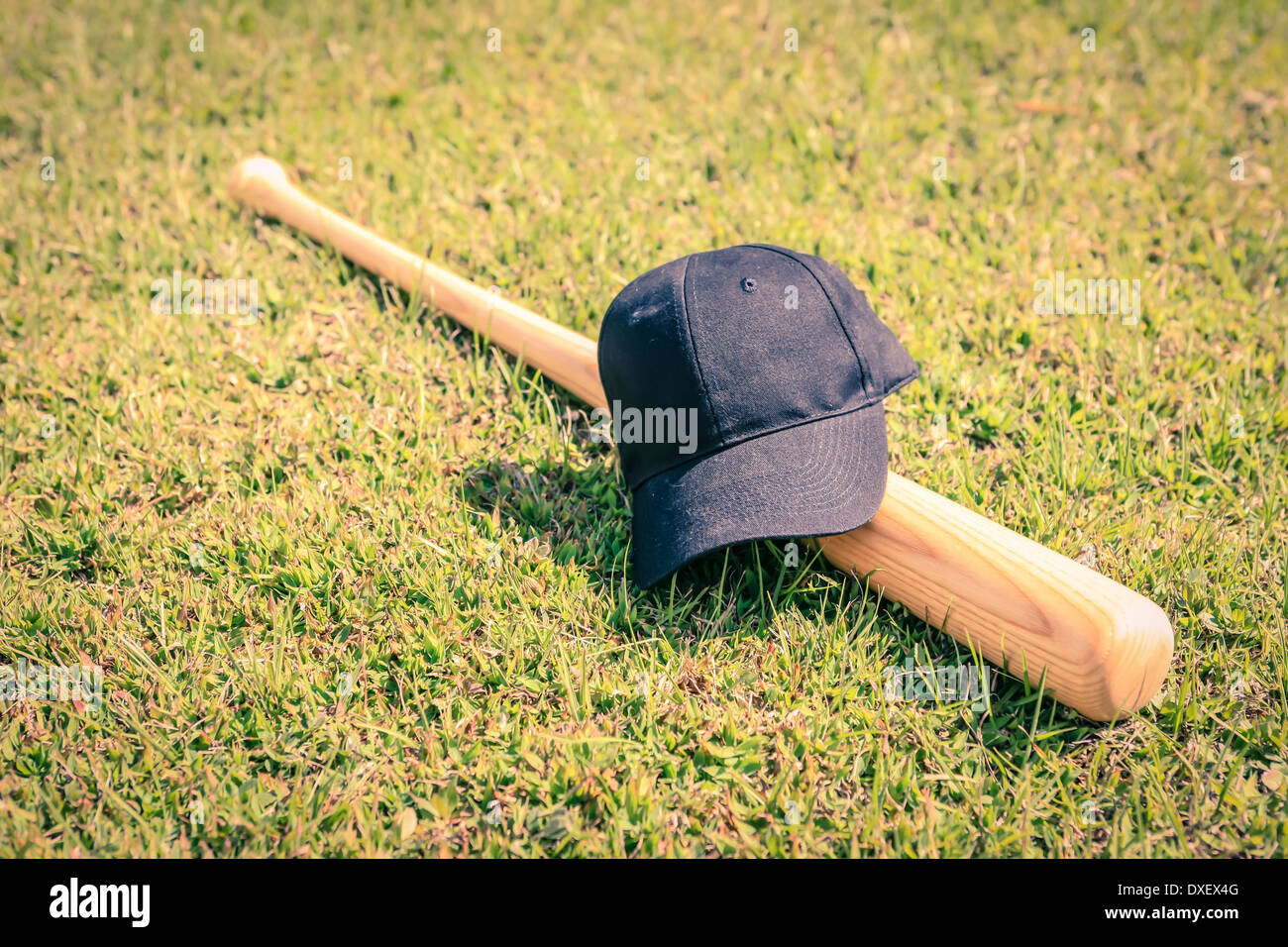 Konzept-Foto von einem Baseball-Schläger und schwarzen Hut Stockfoto