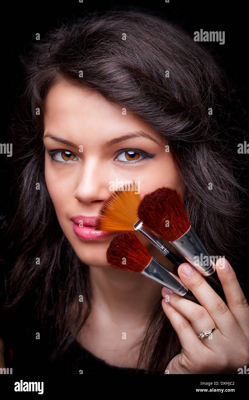 Beauty Mädchen mit Make-up Pinsel Stockfoto