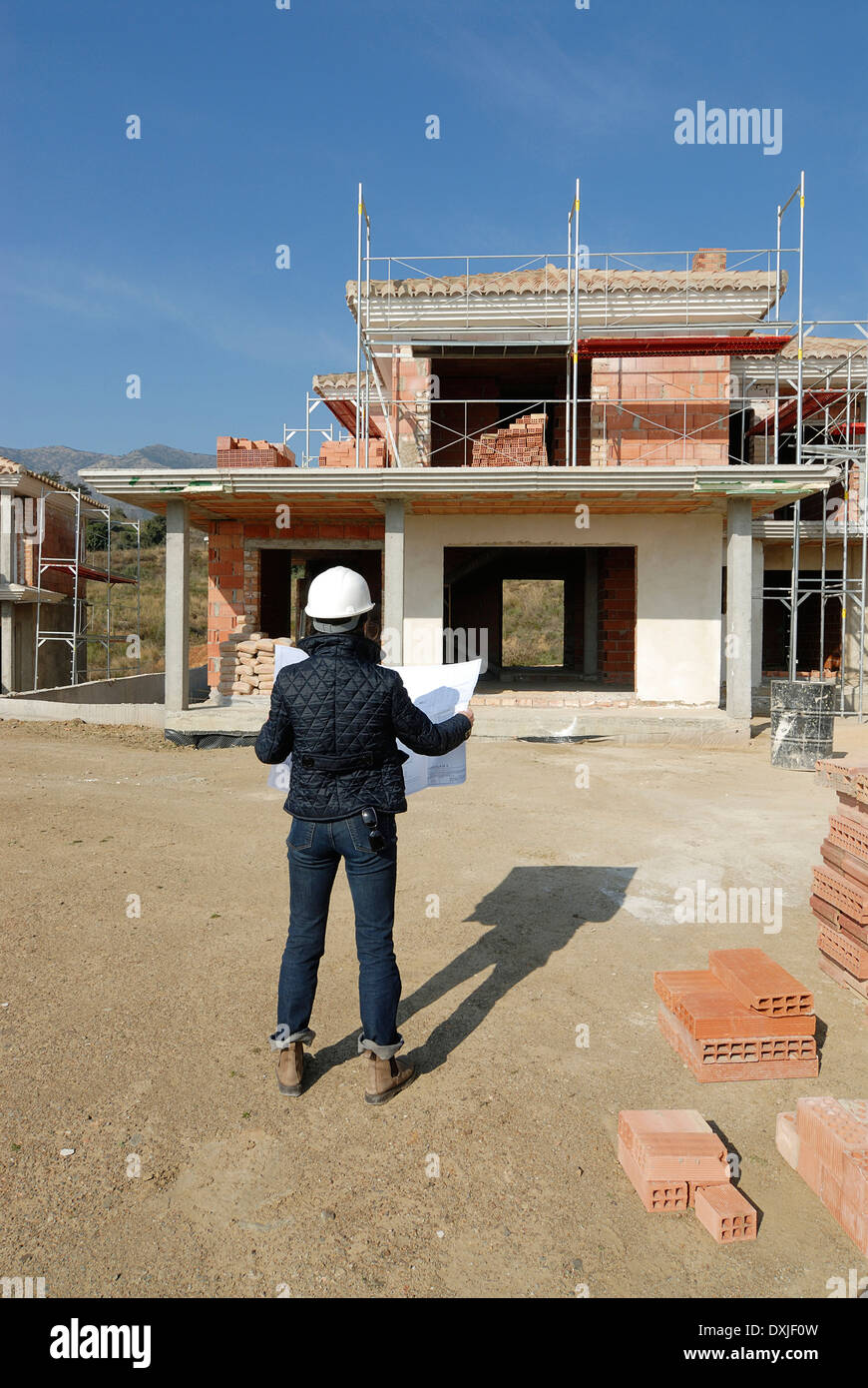 Architektin auf Baustelle Blick auf hintere Draufsicht Stockfoto