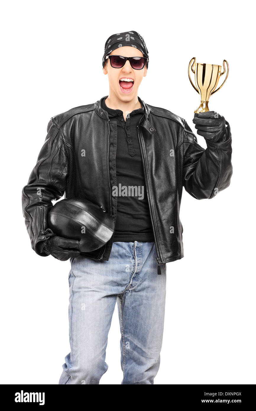 Motorrad-Rennfahrer halten einer Goldschale Stockfoto