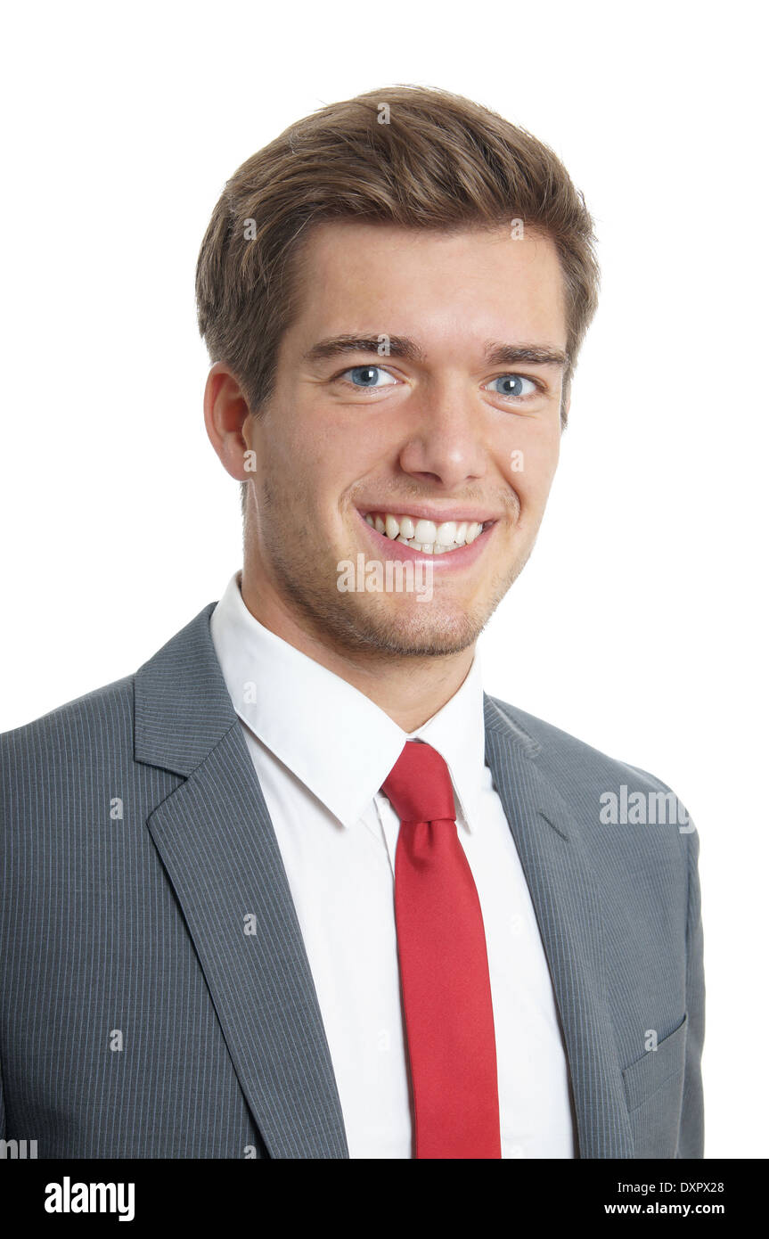 lächelnde junge Unternehmer tragen Anzug und Krawatte Stockfoto
