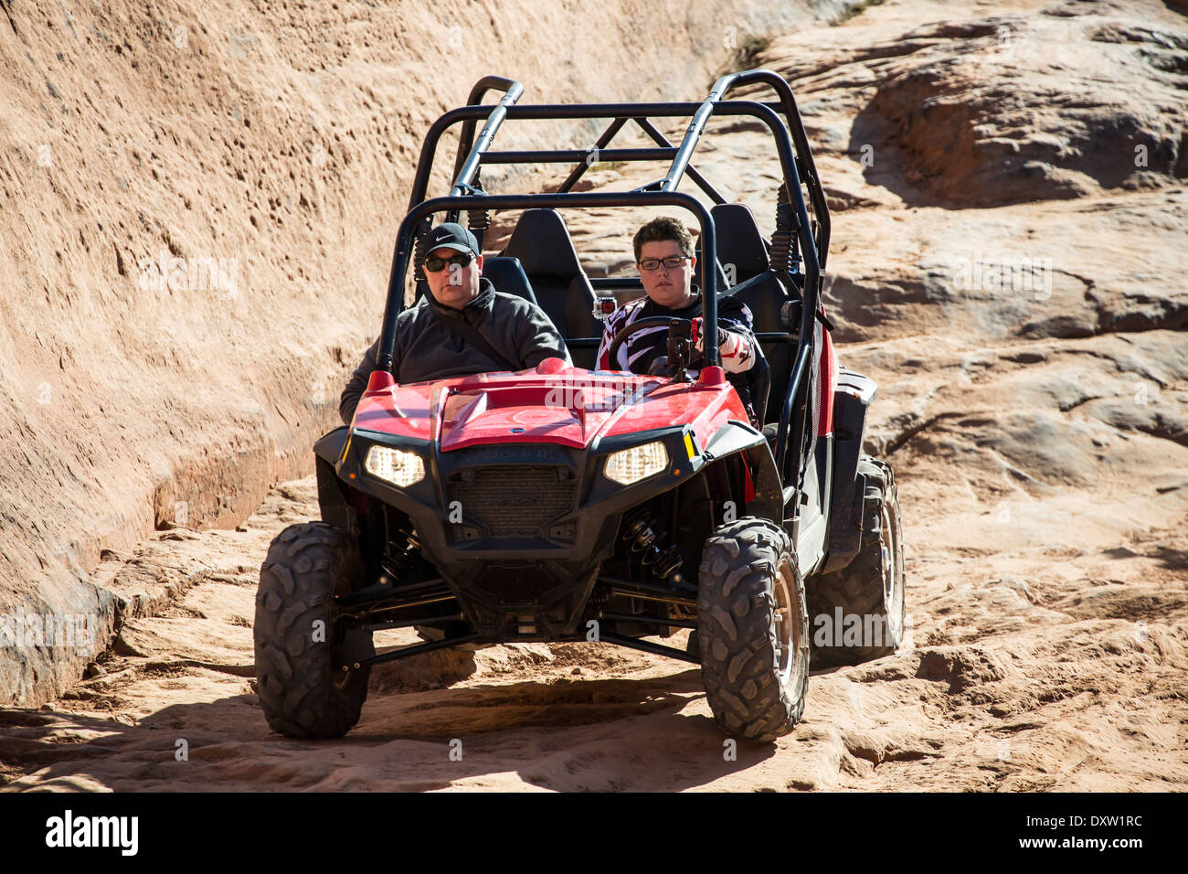 ATV auf der Hölle Rache Trail, Sand Wohnungen Recreation Area, Moab, Utah USA Stockfoto