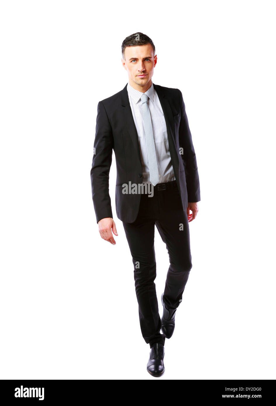 Porträt eines Geschäftsmannes zu Fuß auf einem weißen Hintergrund isoliert Stockfoto
