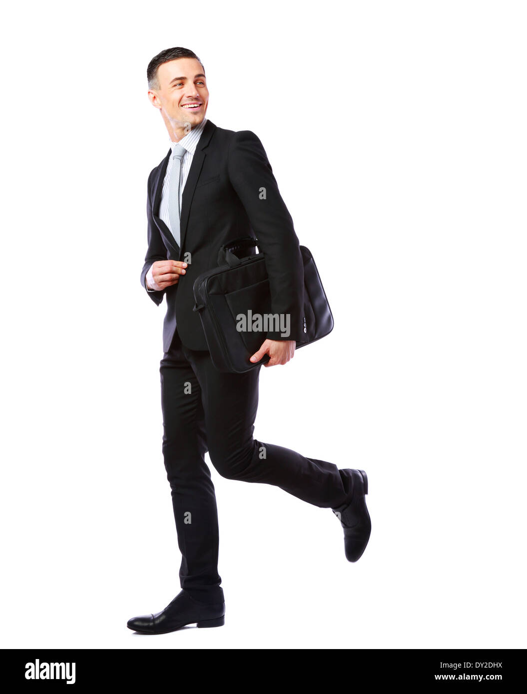 Geschäftsmann zu Fuß mit Laptop-Tasche isoliert auf weißem Hintergrund Stockfoto