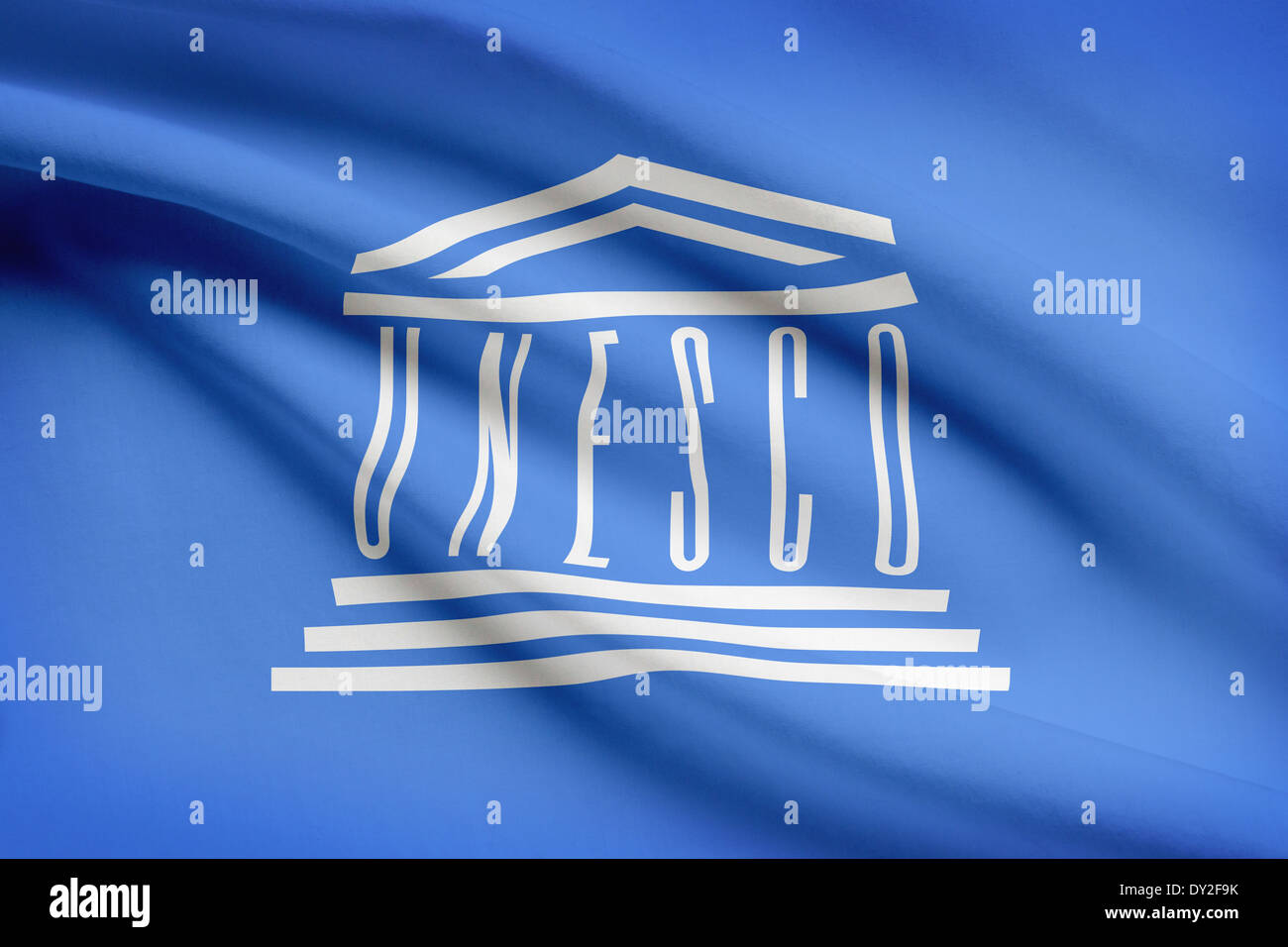 United Nations Educational, Scientific and Cultural Organization (UNESCO) Flagge im Wind wehen. Teil einer Serie. Stockfoto