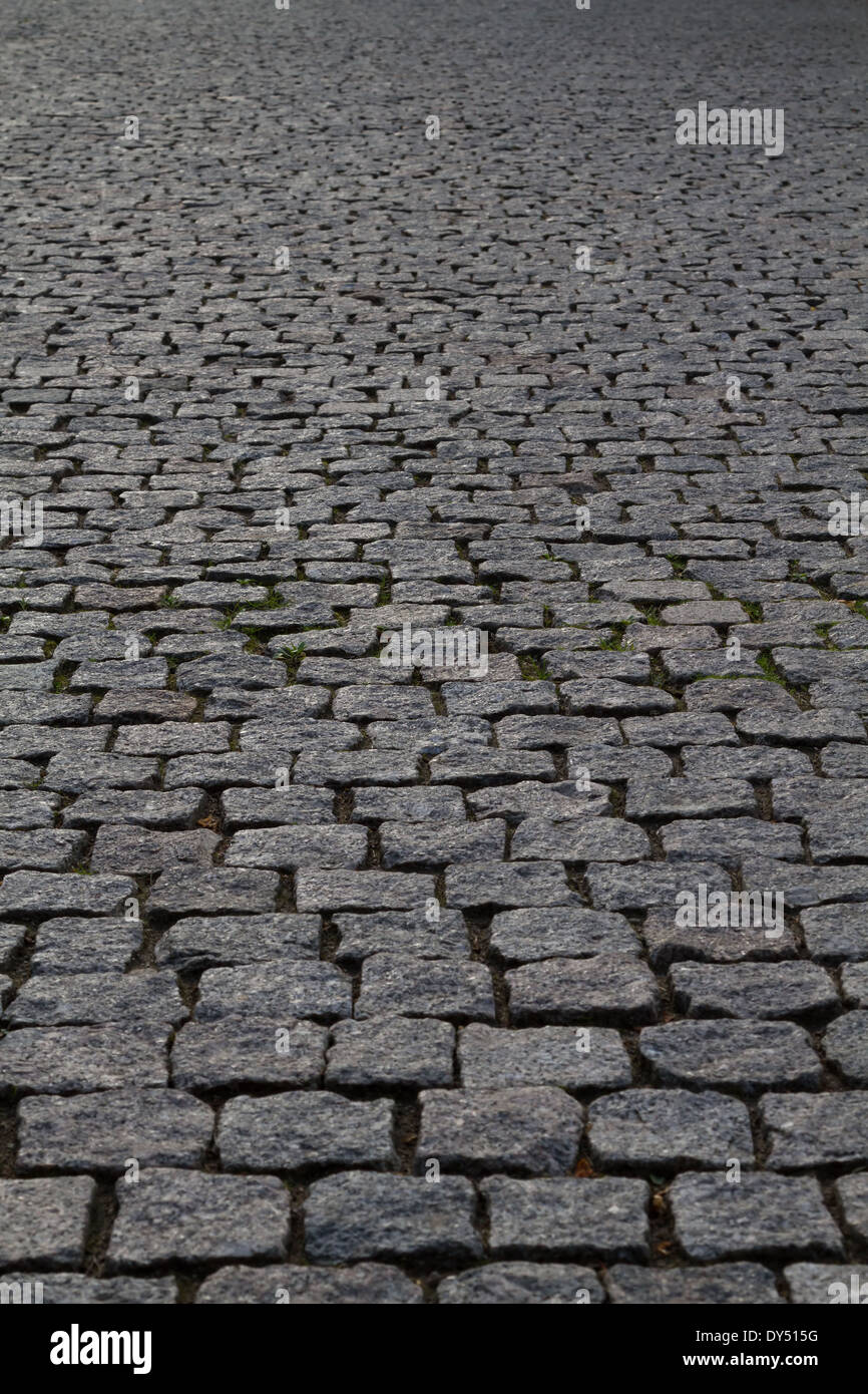 grobem Granit gepflasterten Straße Perspektive Stockfoto