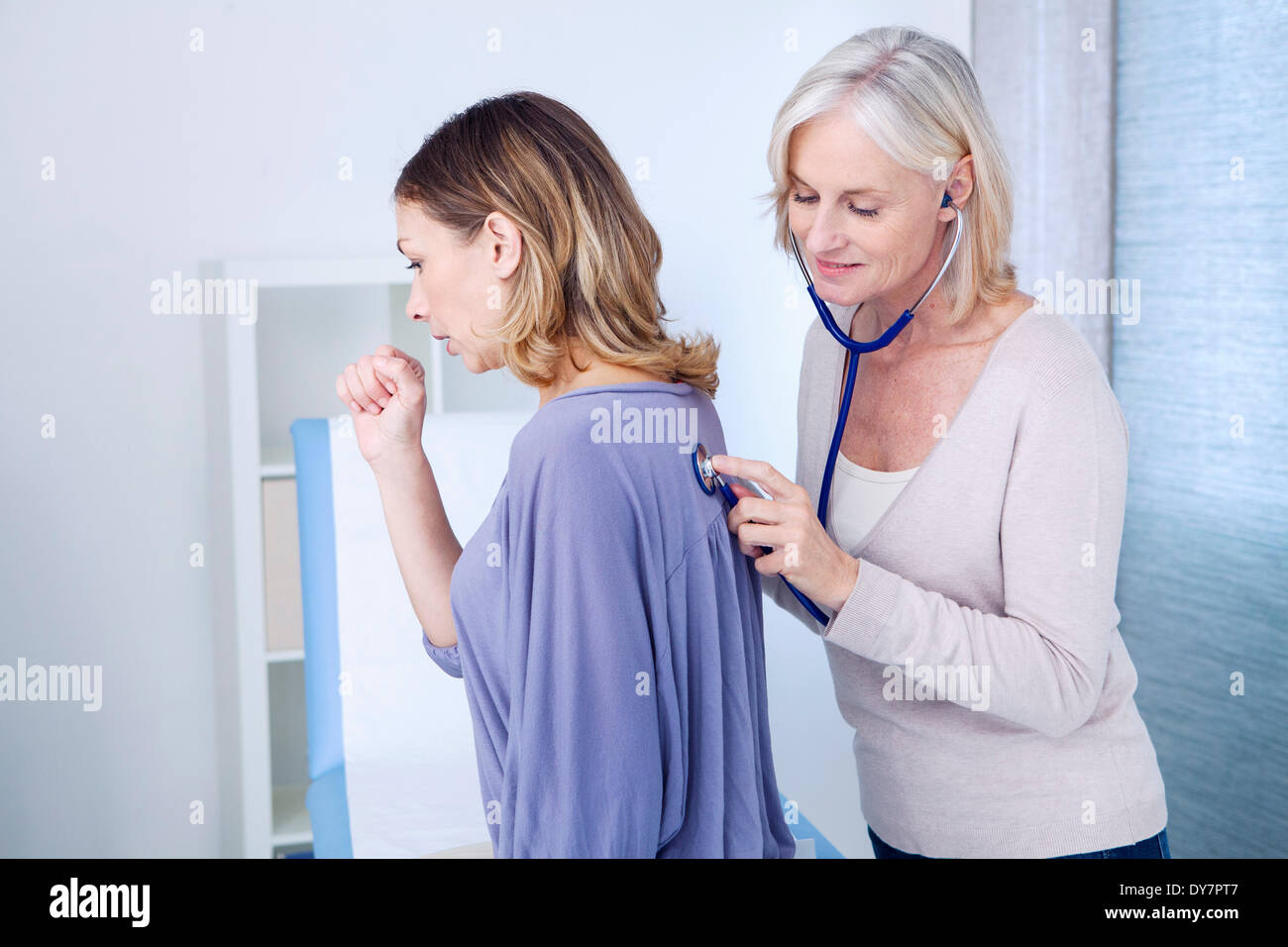 Auskultation, Frau Stockfoto