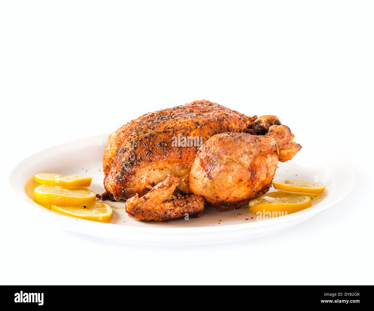 Heiß auf einem weißen Teller gebratenes Huhn Stockfoto