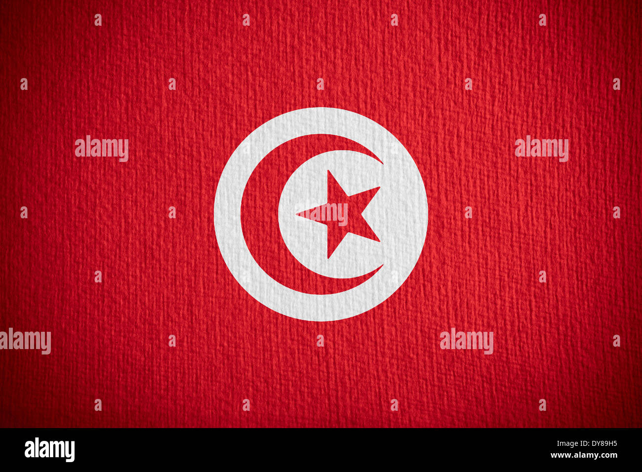 Flagge von Tunesien oder tunesische Banner auf Papierhintergrund Stockfoto