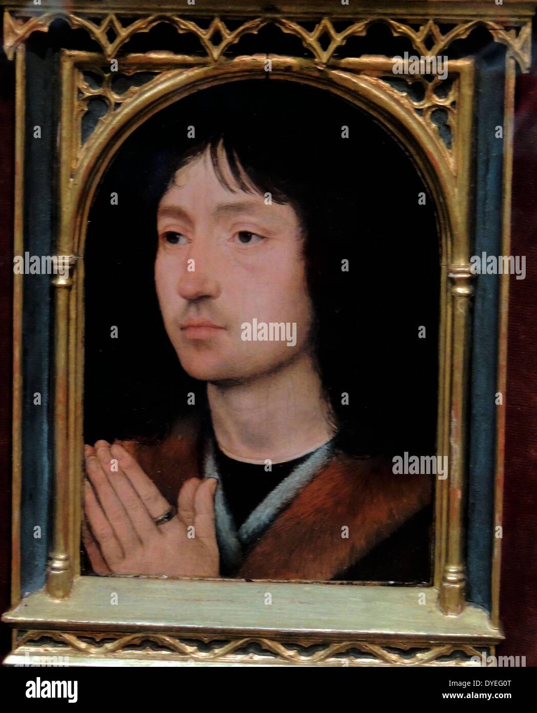 Porträt eines jungen Mannes im Gebet von Hans Memling 1487 n. Chr. Stockfoto