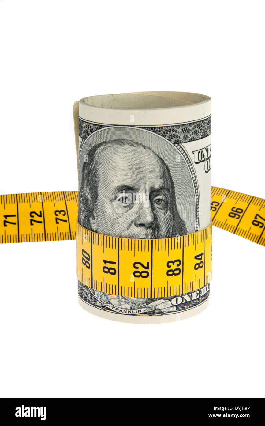 Ein Symbol Bild Economy-Paket mit Dollar-Schein und Maßband, Ein Symbolbild Sparpaket Mit Dollar-Geldschein Und Massband Stockfoto