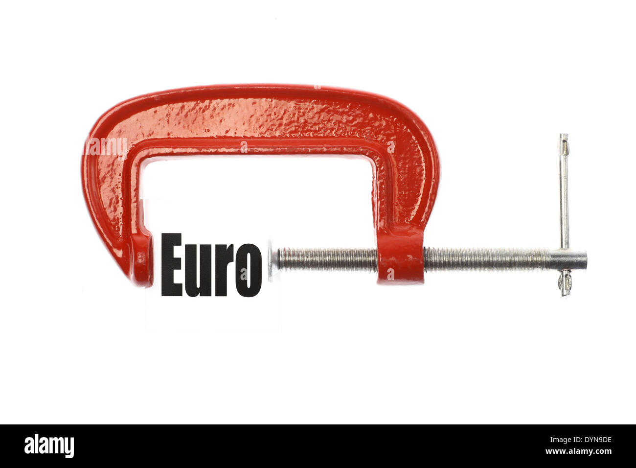 Das Wort "Euro" ist mit einem Schraubstock komprimiert. Business-Metapher. Stockfoto