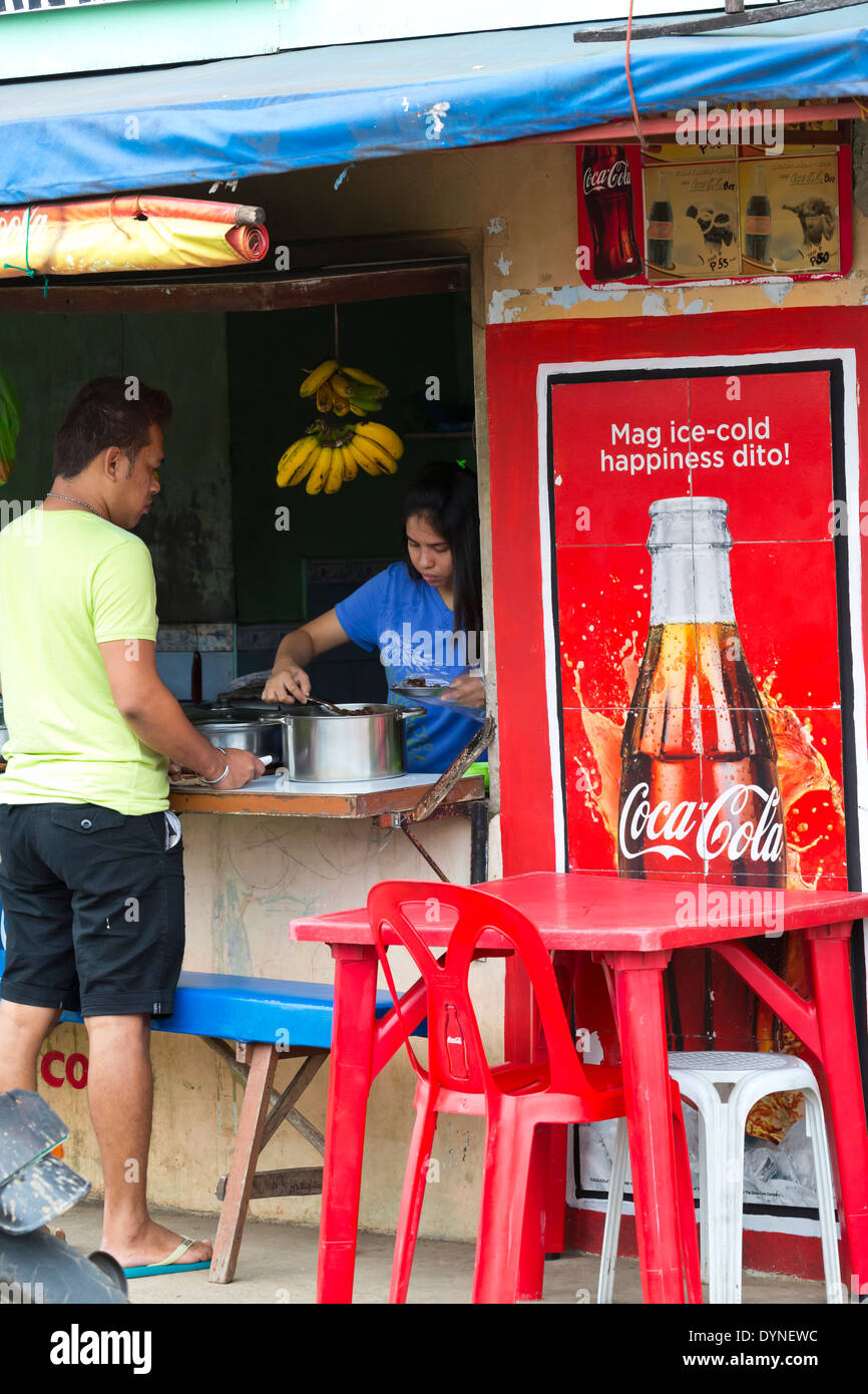 Coca Cola Plakat in Puerto Princesa, Palawan, Philippinen Stockfoto