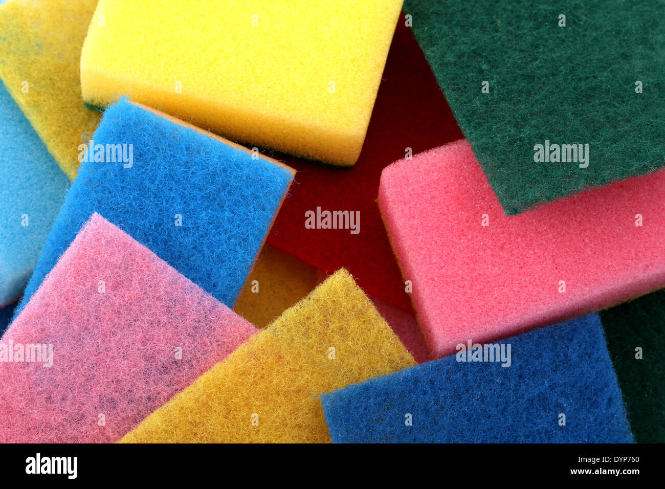 Eine Menge von Schwämmen in verschiedenen Farben-Hintergrund Stockfoto