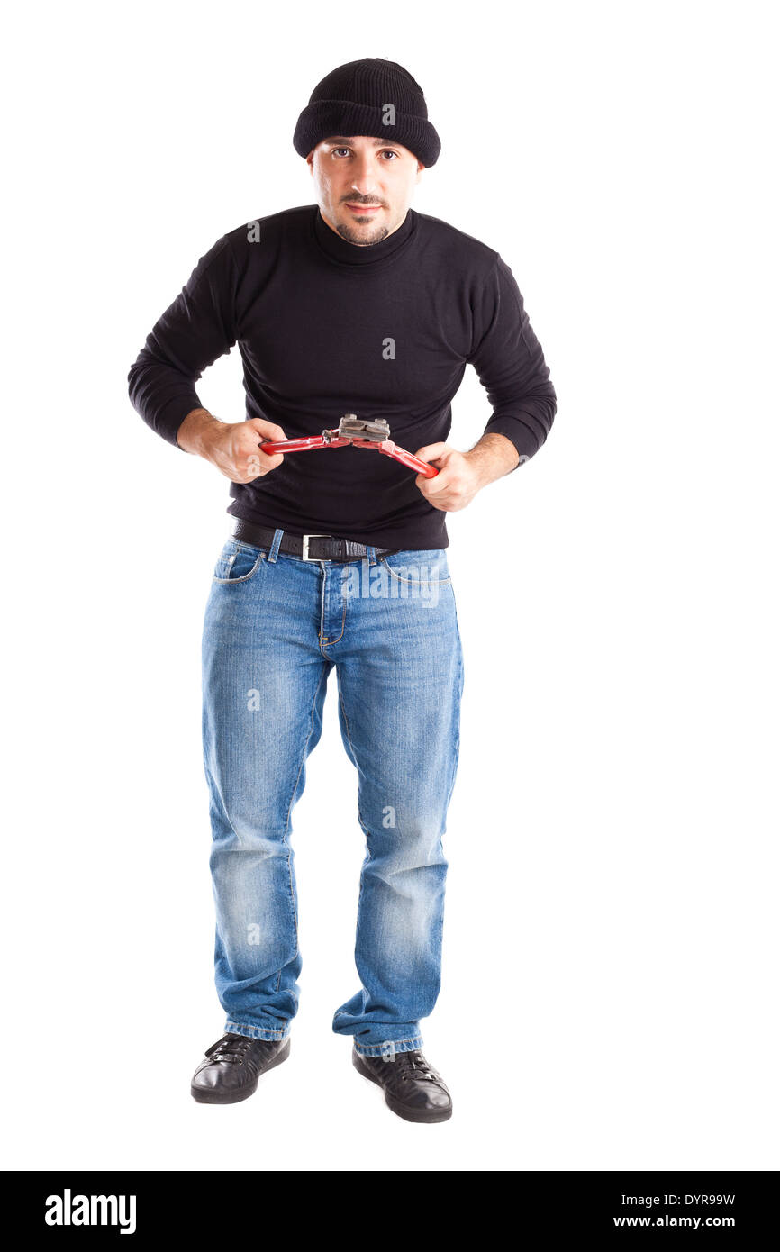 ein Einbrecher oder ein Dieb hält große Drahtschneider Stockfoto