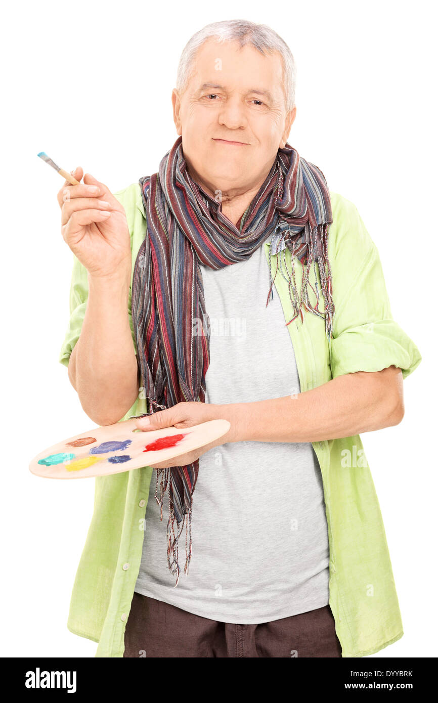 Reife Künstler halten eine Farbpalette und einem Pinsel Stockfoto