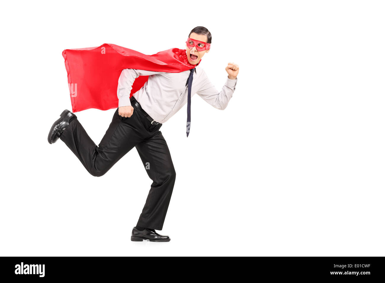Mann in Superhelden-Kostüm auf der Flucht vor etwas Angst Stockfoto