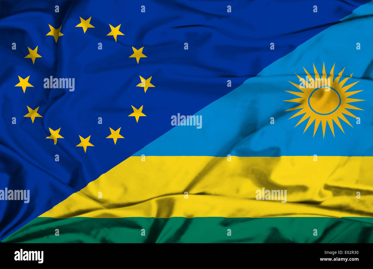 Wehende Flagge von Ruanda und EU Stockfoto