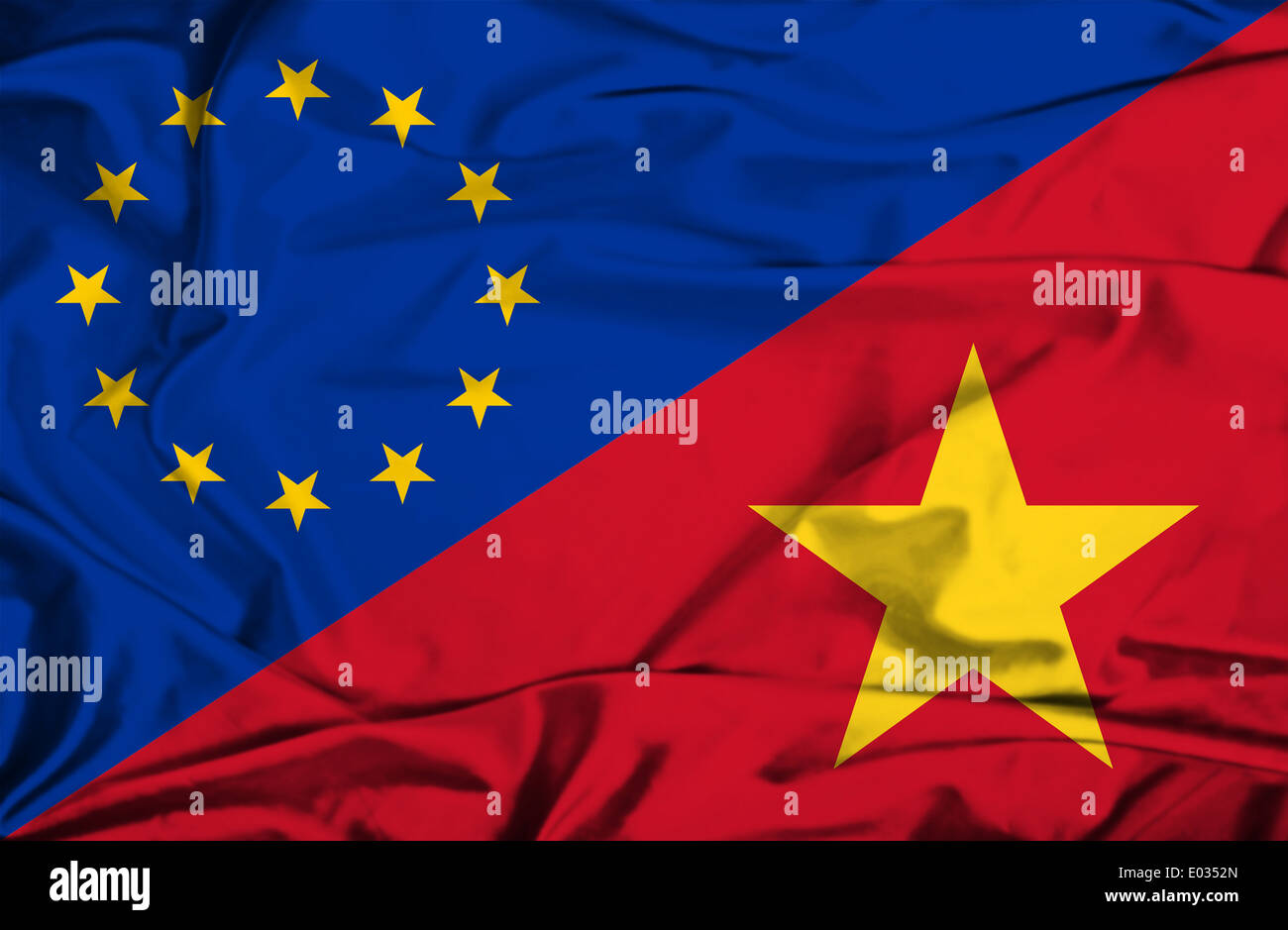 Wehende Flagge von Vietnam und EU Stockfoto