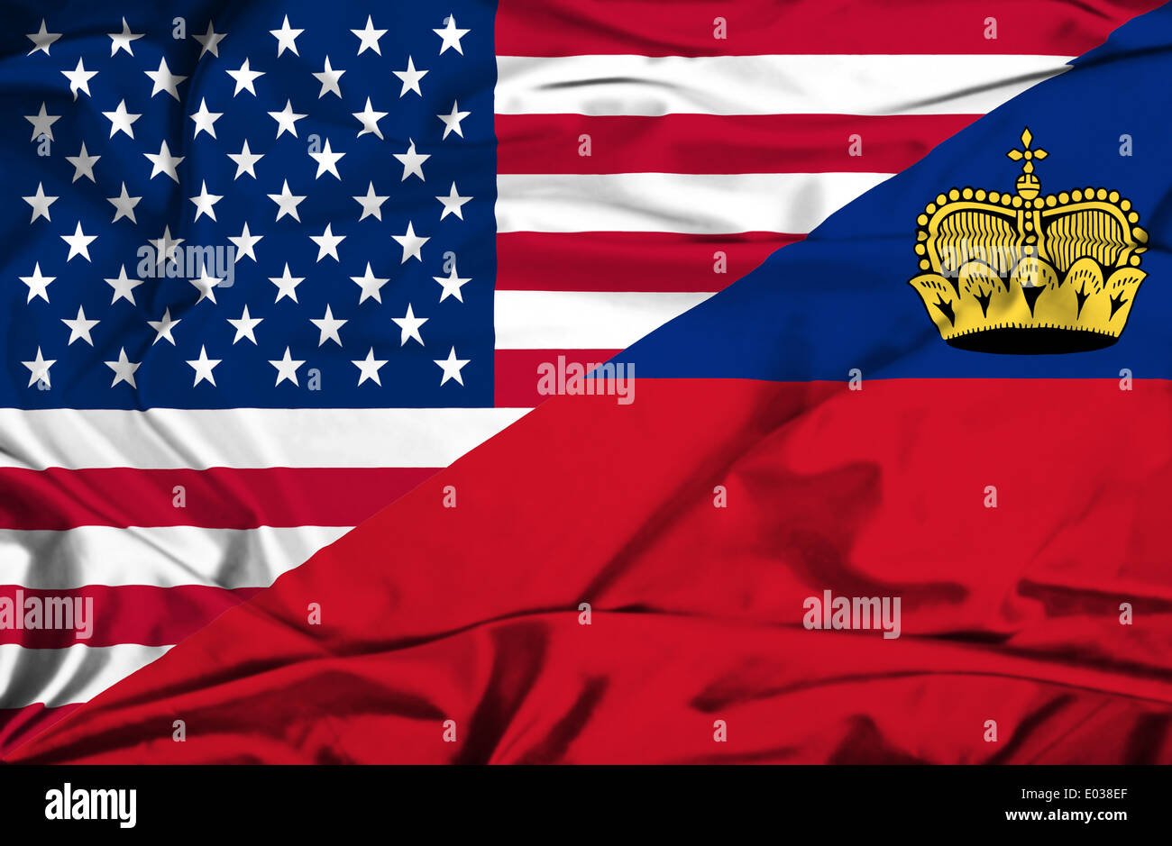 Wehende Flagge von Lichtenstein und USA Stockfoto
