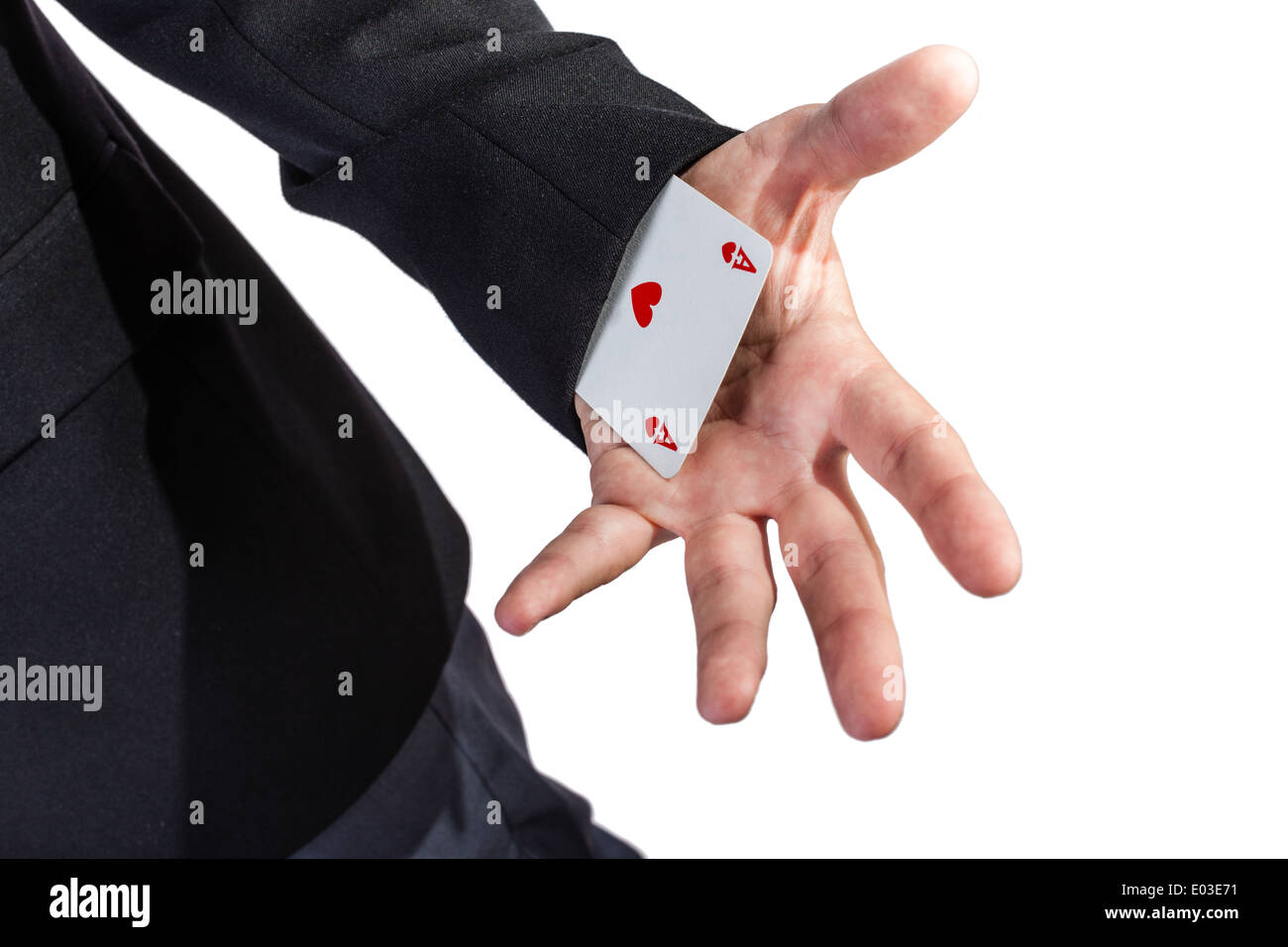 ein eleganter junger Geschäftsmann, Kartentricks mit Pokerkarten Stockfoto