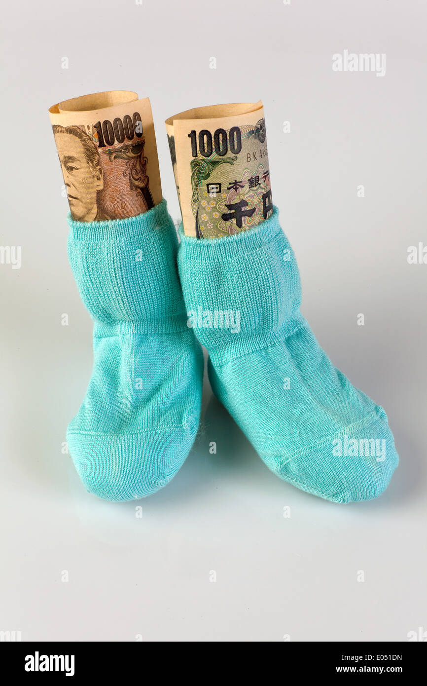 Kinder Socken mit Yen, Banknoten, Kinder Socken Mit Yen Geldscheinen Stockfoto