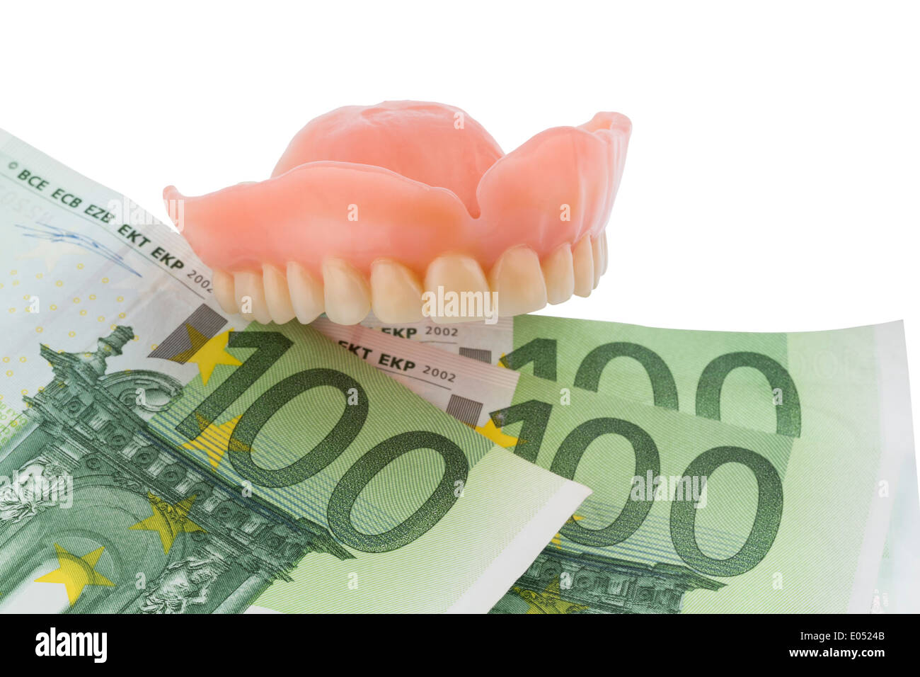 Satz von Zähnen und Schutztechniken, symbolische Foto für Prothesen, medizinische Kosten und Zuzahlung, Gebiss Und Euroscheine, Sy Stockfoto