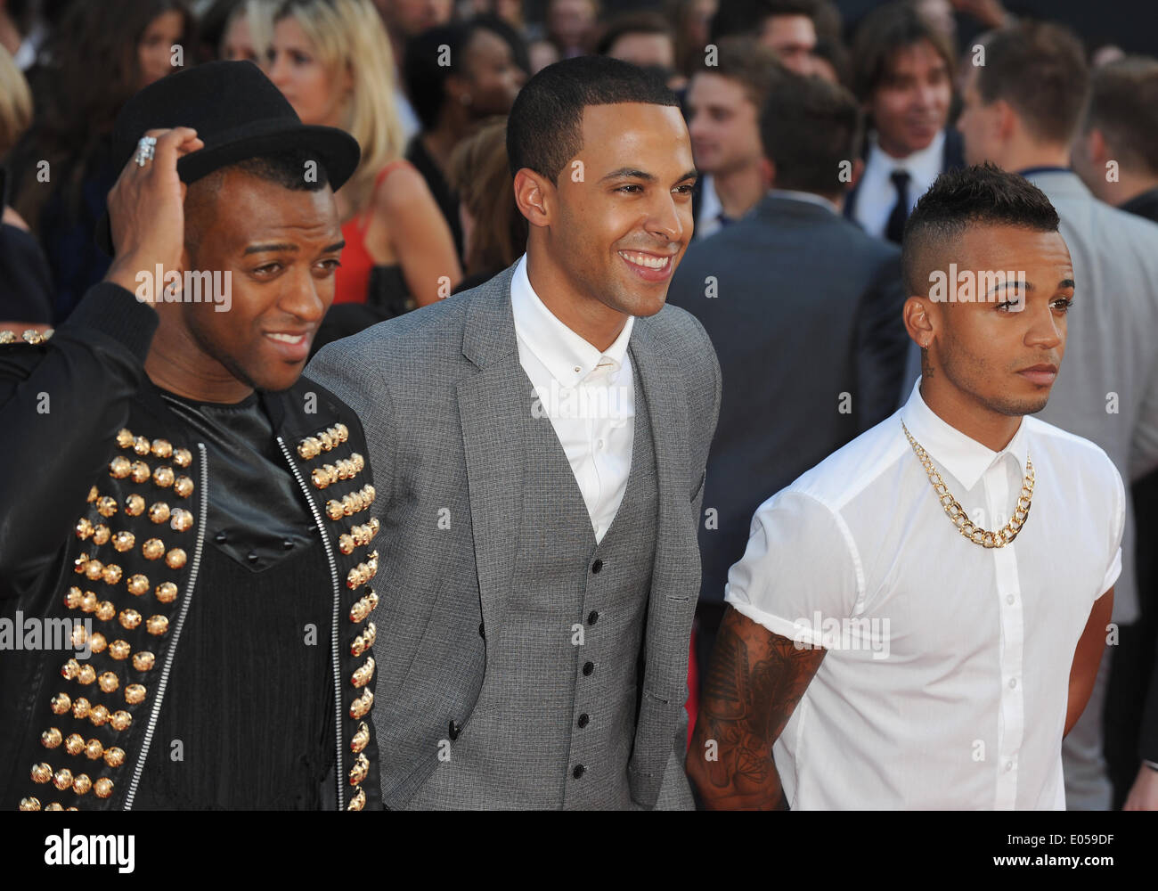 London, UK, UK. 20. August 2013. Ortis Williams, Marvin Humes und Aston Merrygold der ZLS besuchen die Weltpremiere von "One Direction: This Is Us an Empire Leicester Square. © Ferdaus Shamim/ZUMA Wire/ZUMAPRESS.com/Alamy Live-Nachrichten Stockfoto