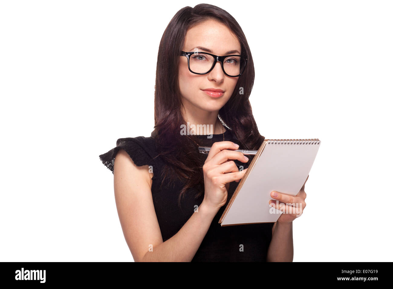 Studentin in Gläsern mit notepad Stockfoto