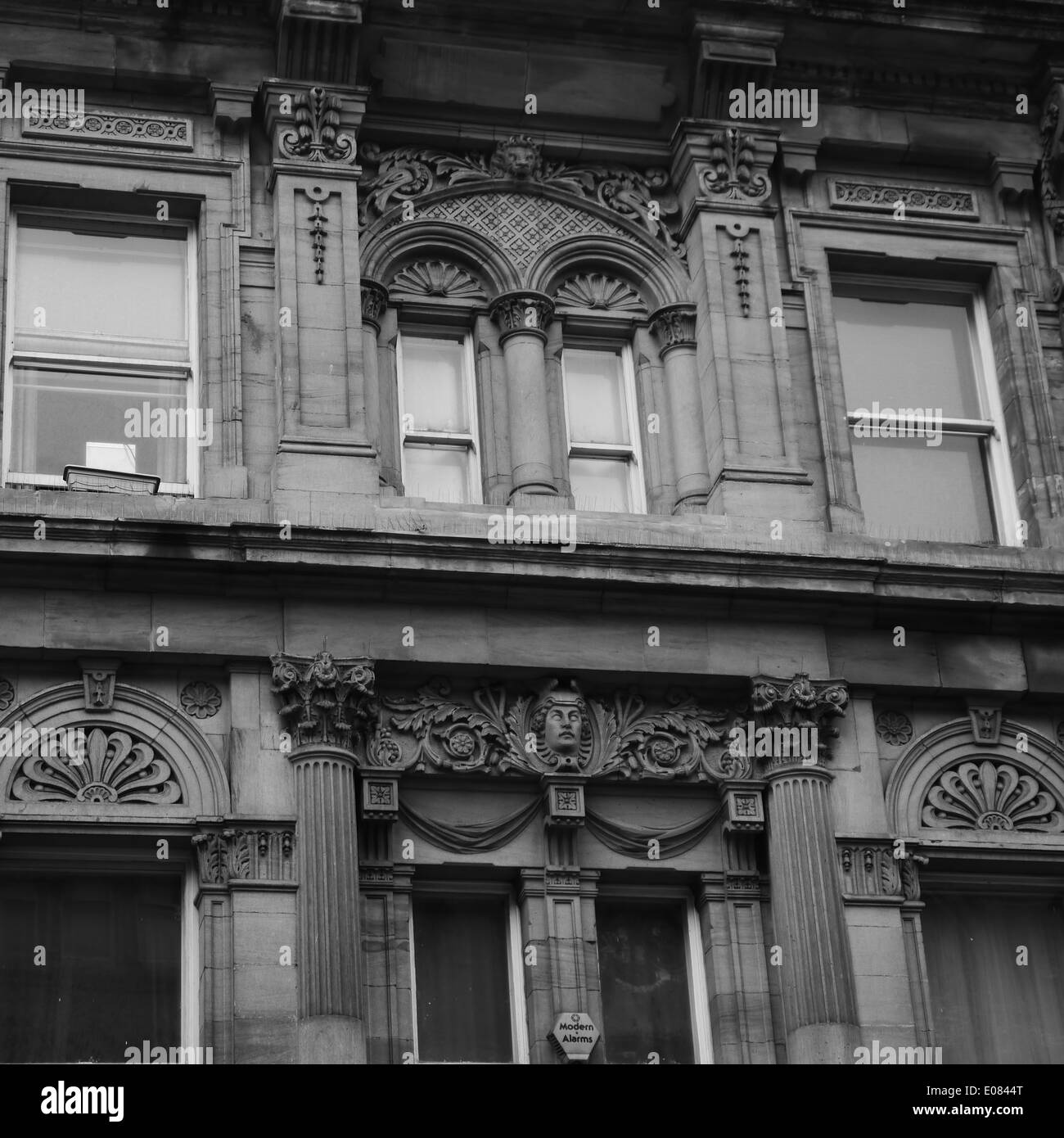 Architektonisches Detail, einschließlich arcuated Stürze und Säulen, der neoklassizistische Gebäude, Grainger Street, Newcastle upon Tyne Stockfoto