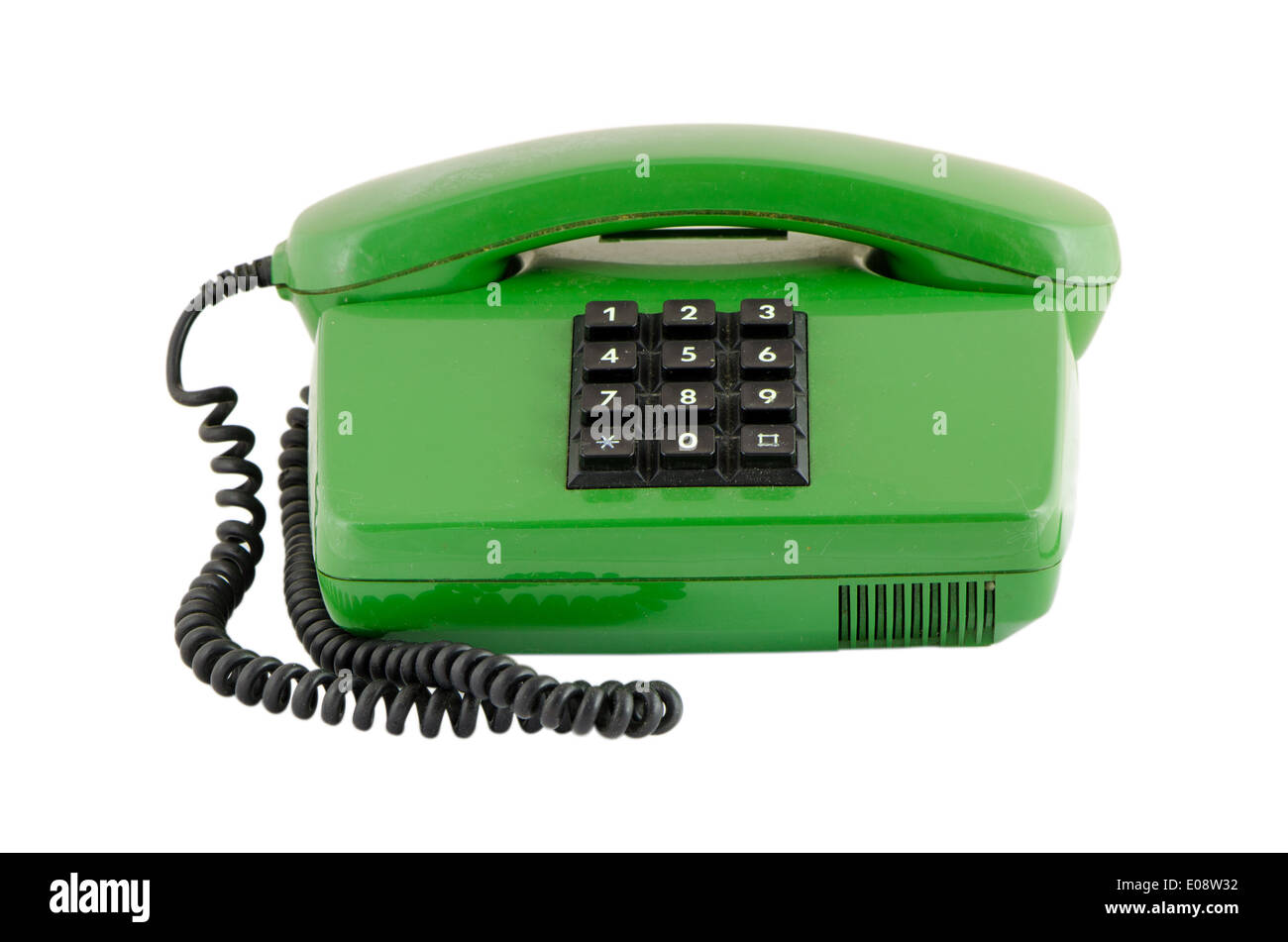 Altes grünes Haus-Telefon mit schwarzen Knöpfen isoliert auf weißem Hintergrund Stockfoto