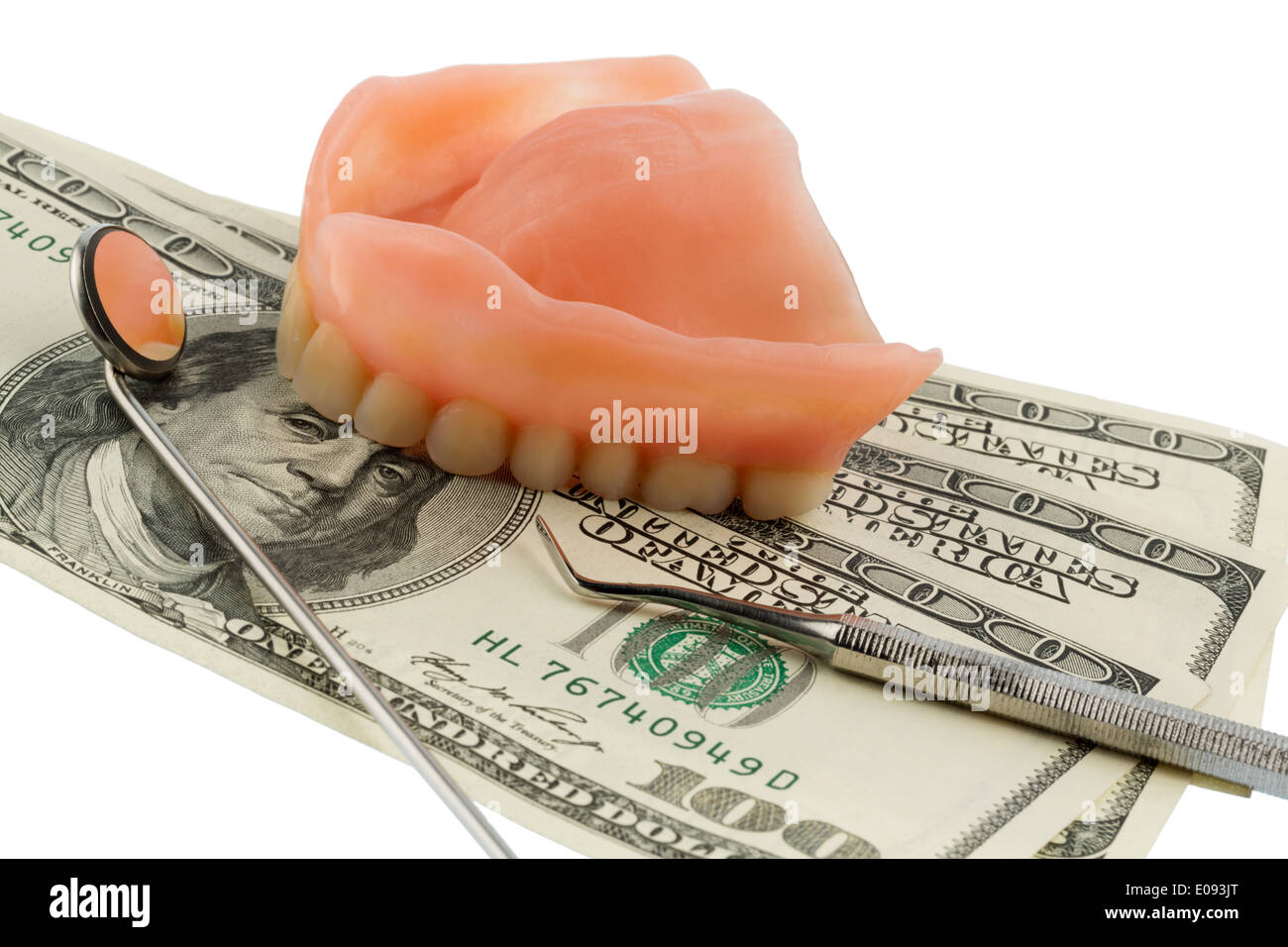 Satz von Zähnen und Dollarnoten, symbolische Foto Fue von Zahnersatz, Arztkosten und Zuzahlung, Gebiss Und Dollarschein Stockfoto
