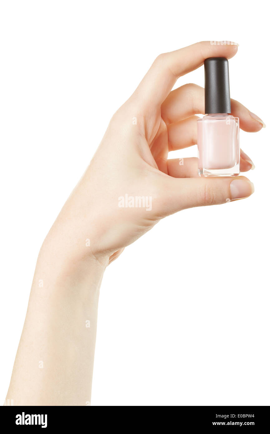 Weibliche Hand mit rosa Nagellack Flasche Stockfoto