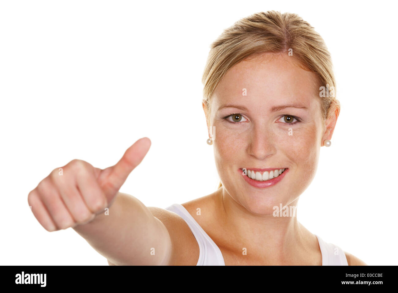Eine junge, erfolgreiche Frau hält die Daumen nach oben. Symbolisches Bild für Erfolg, befreit mehr zu Hintergrund, Eine weiße Stockfoto
