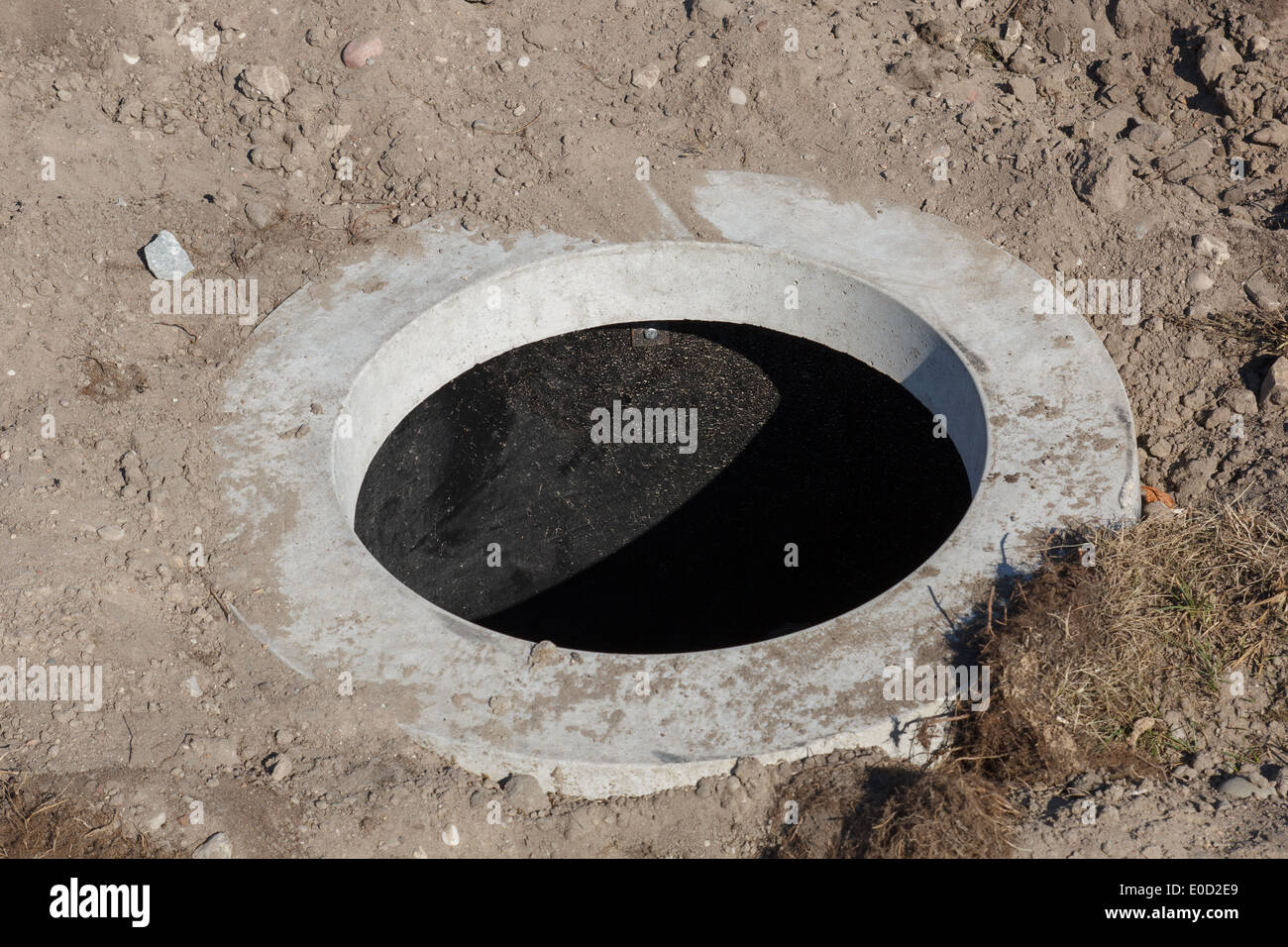 Kanalisation Loch in einer Baustelle Stockfoto