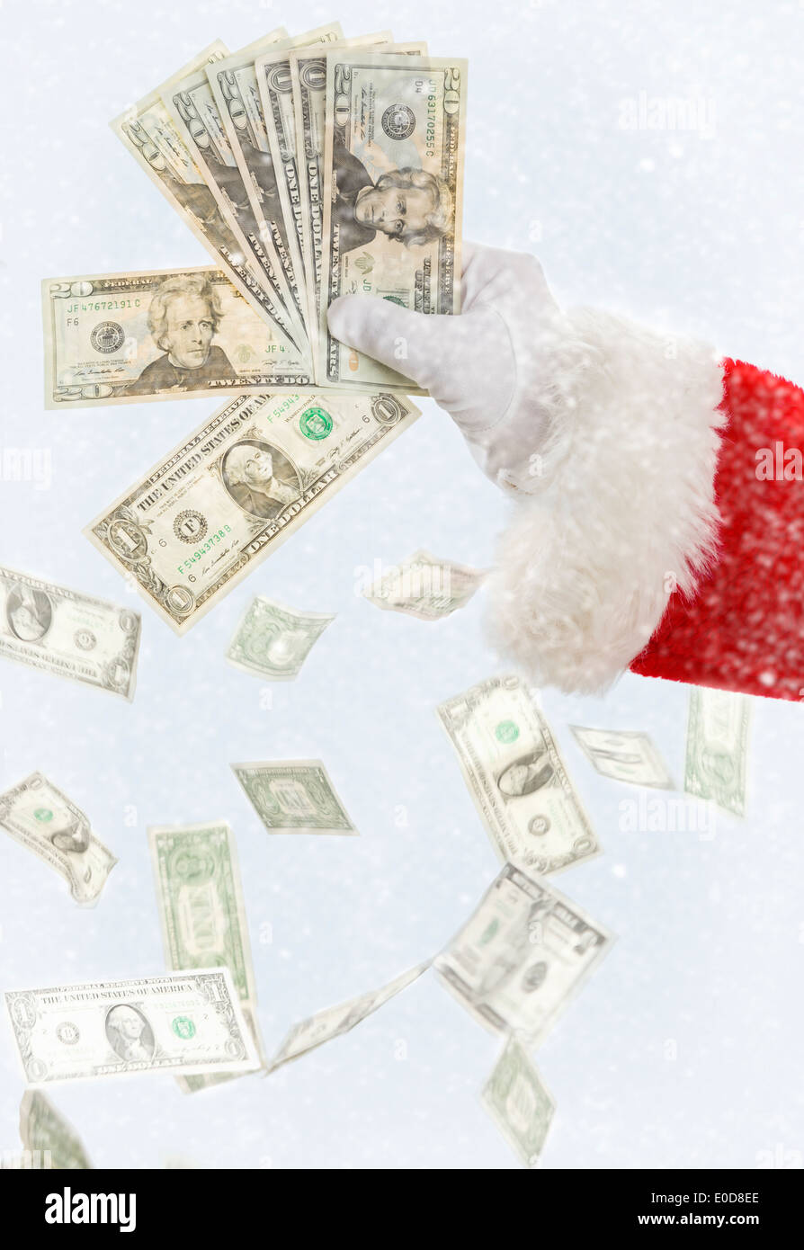 Santa mit Papiergeld, Banknoten herunterfallen Stockfoto