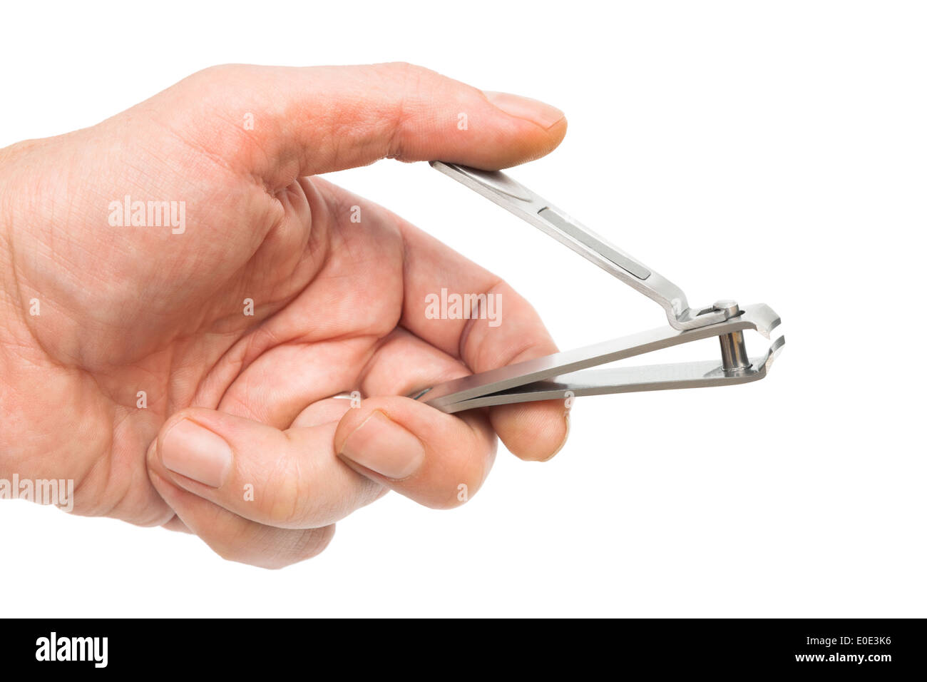 Stahl Nagelknipser in der Hand auf weißem Hintergrund Stockfoto